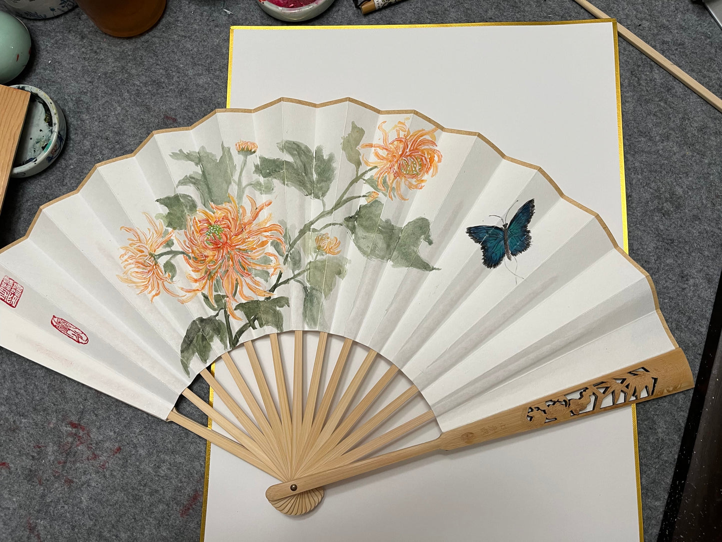 Traditional Chinese brush paintings on folding fans