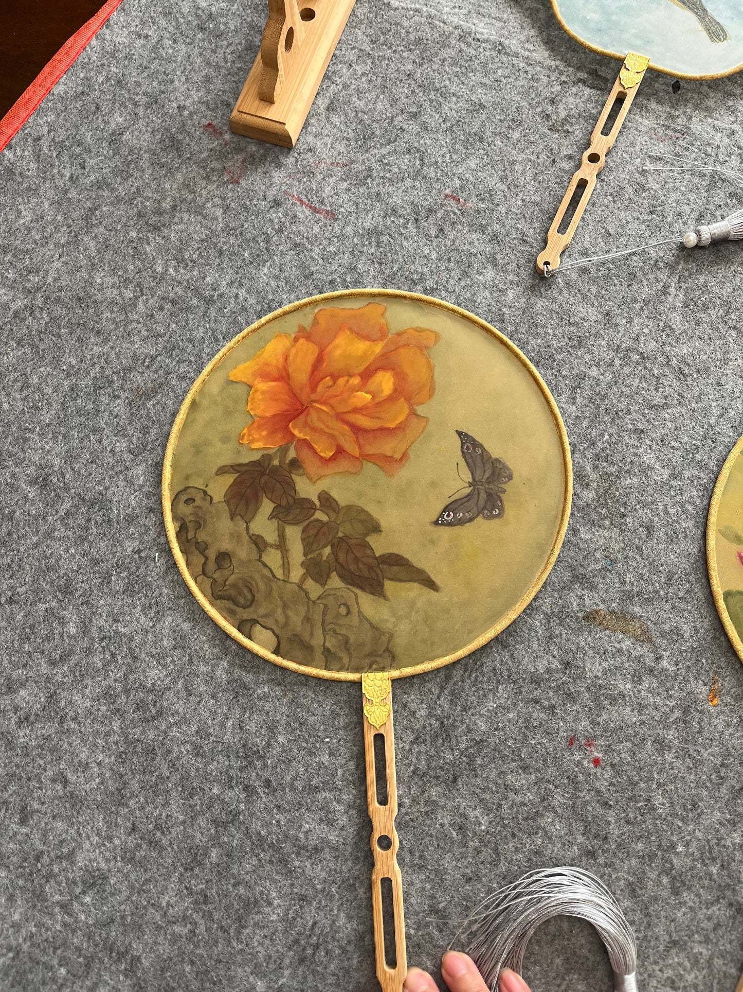 Traditional Chinese brush paintings on silk fans