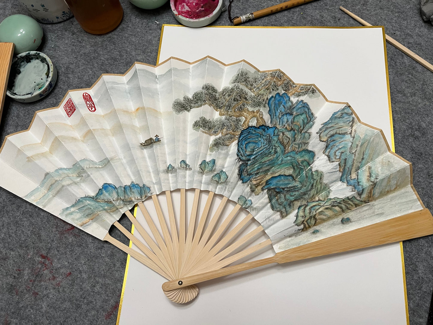 Traditional Chinese brush paintings on folding fans