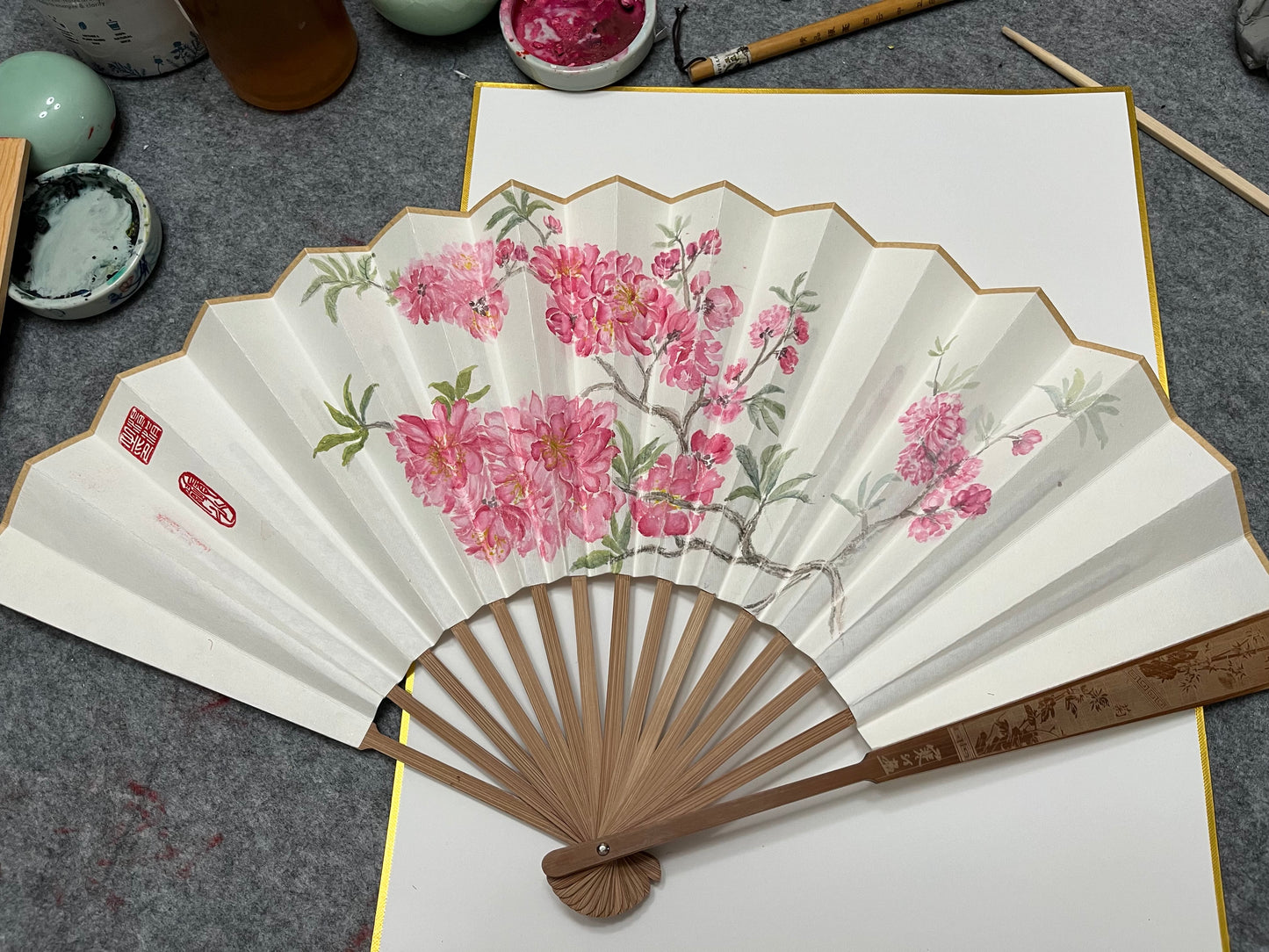 Traditional Chinese brush paintings on folding fans