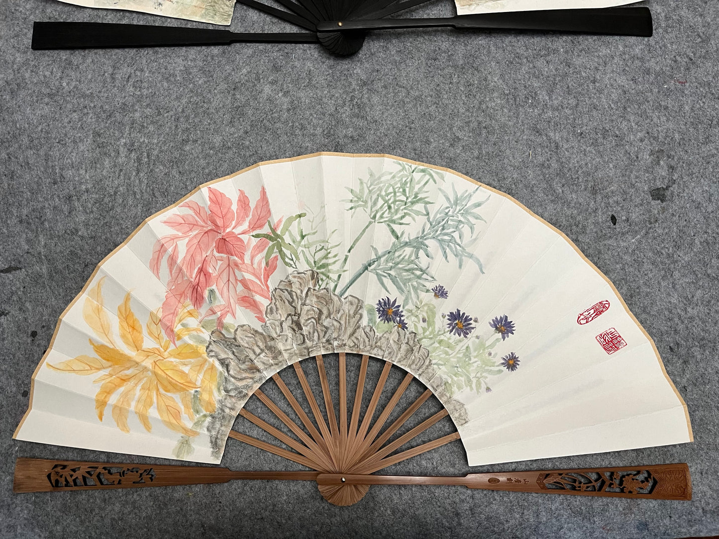 Traditional Chinese brush paintings on folding fans