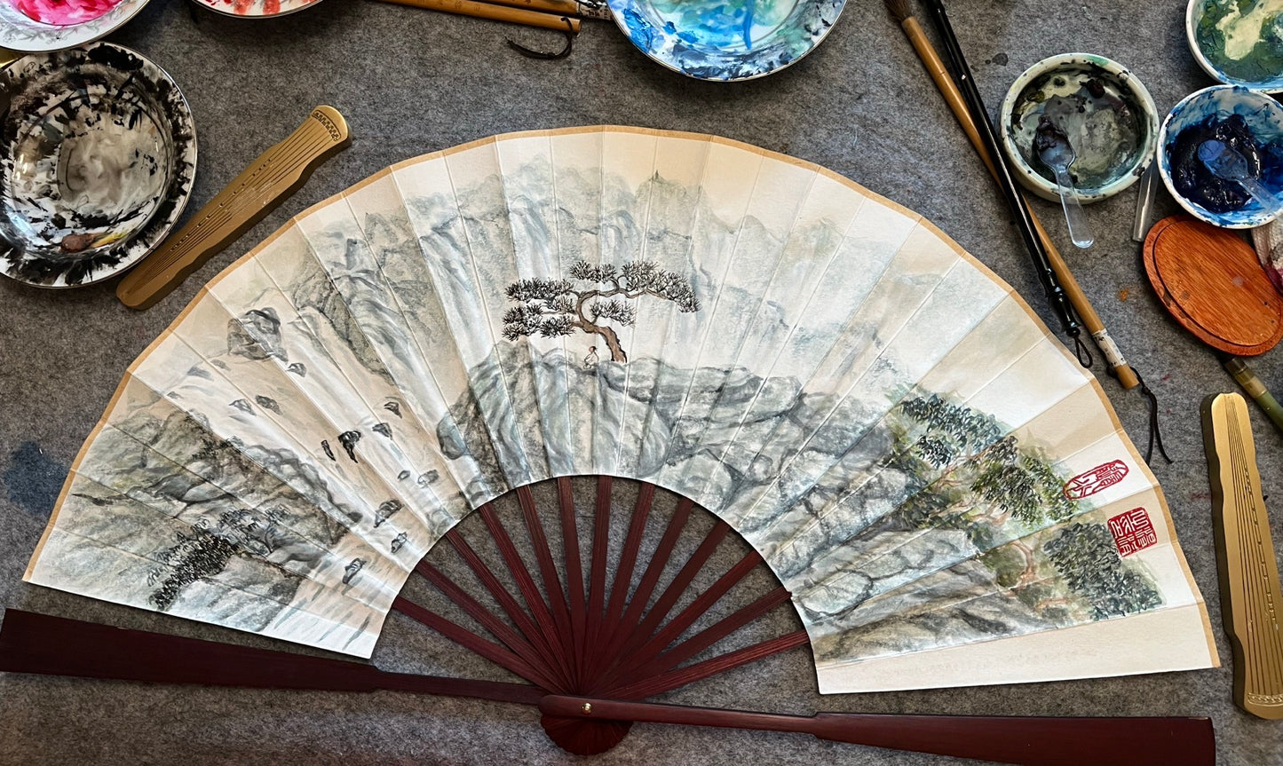 Traditional Chinese brush paintings on folding fans