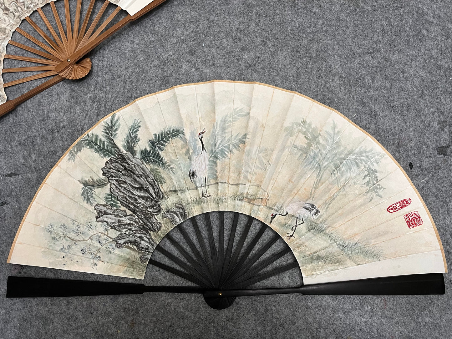 Traditional Chinese brush paintings on folding fans