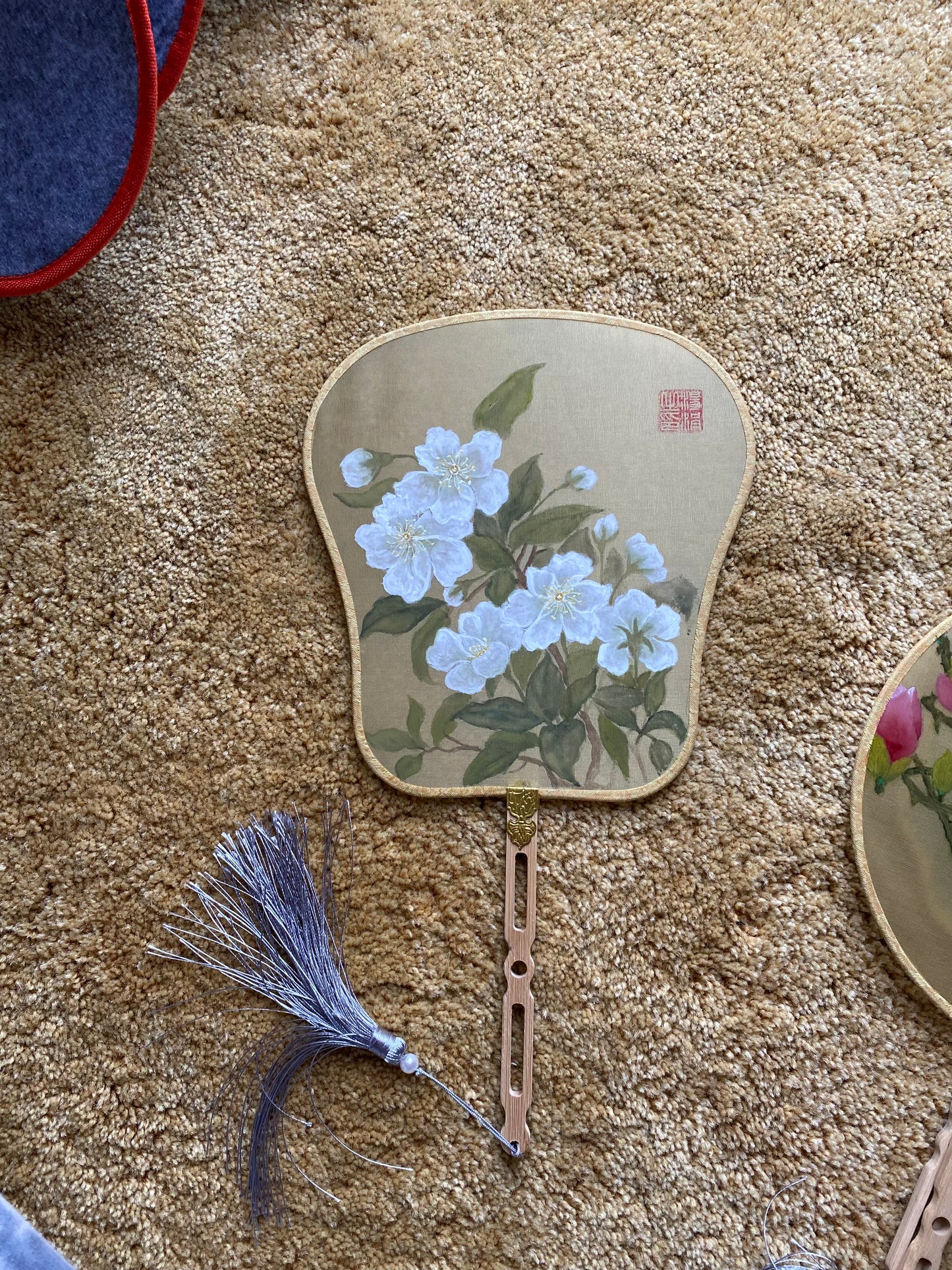 Traditional Chinese brush paintings on silk fans