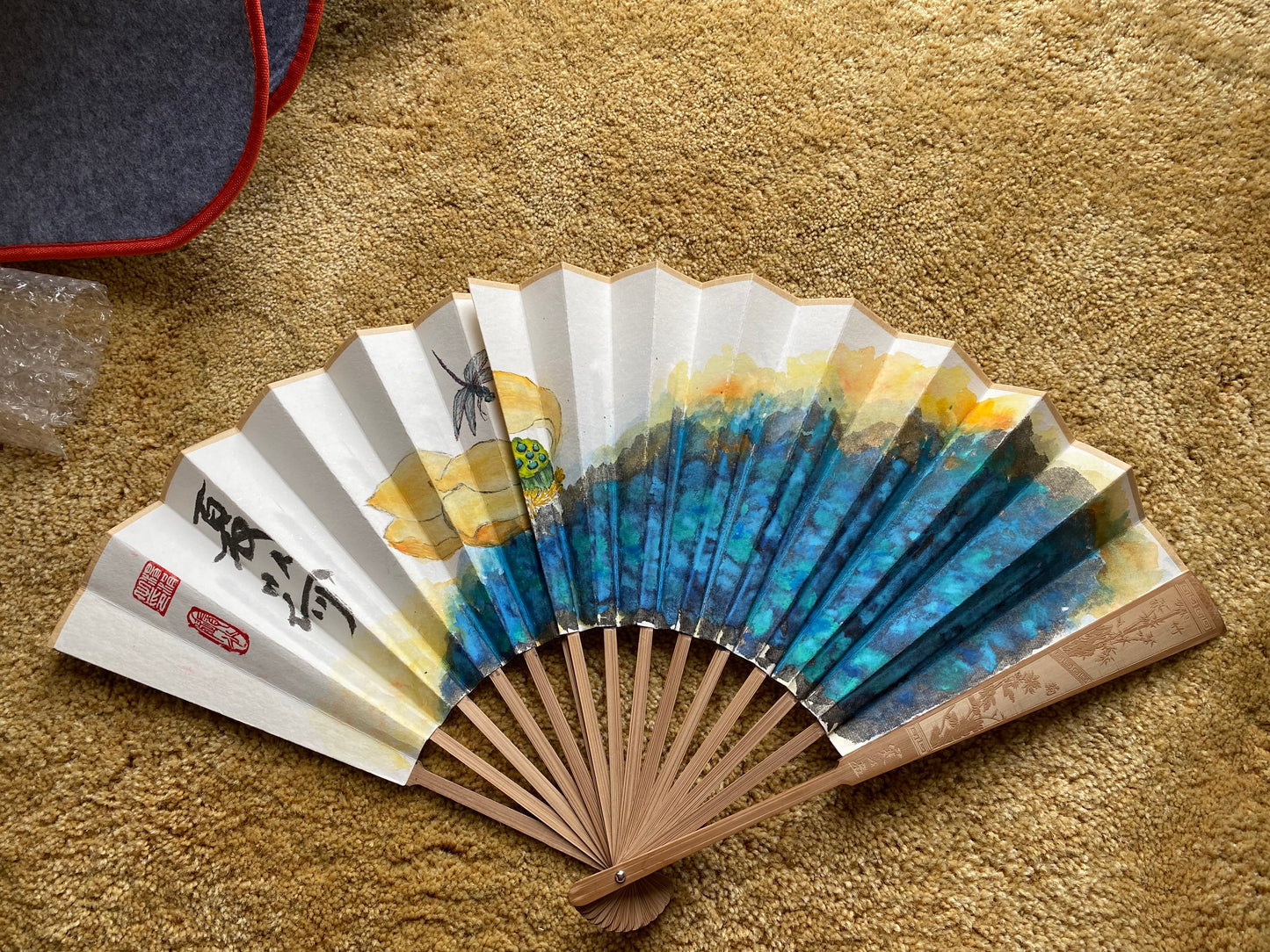 Traditional Chinese brush paintings on folding fans